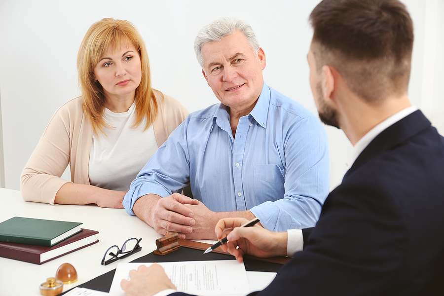 elderly couple discussing about durable power of attorney